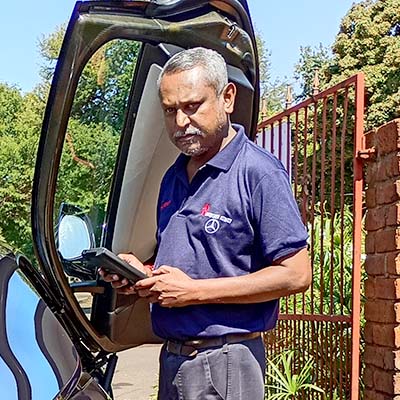 Reuben at Reuben’s Auto Services workshop in Centurion